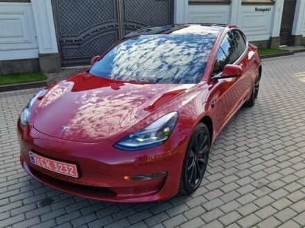 Красный Тесла Модель 3, объемом двигателя 0 л и пробегом 64 тыс. км за 23000 $, фото 1 на Automoto.ua