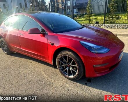 Красный Тесла Модель 3, объемом двигателя 0.2 л и пробегом 160 тыс. км за 18000 $, фото 1 на Automoto.ua