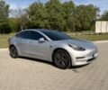 Серый Тесла Модель 3, объемом двигателя 0 л и пробегом 141 тыс. км за 15400 $, фото 3 на Automoto.ua