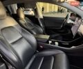 Серый Тесла Модель 3, объемом двигателя 0 л и пробегом 130 тыс. км за 14500 $, фото 3 на Automoto.ua