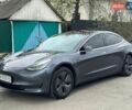 Серый Тесла Модель 3, объемом двигателя 0 л и пробегом 140 тыс. км за 16700 $, фото 1 на Automoto.ua