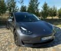 Серый Тесла Модель 3, объемом двигателя 0 л и пробегом 56 тыс. км за 23000 $, фото 1 на Automoto.ua