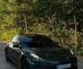 Серый Тесла Модель 3, объемом двигателя 0 л и пробегом 74 тыс. км за 23000 $, фото 1 на Automoto.ua