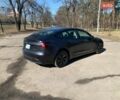 Серый Тесла Модель 3, объемом двигателя 0 л и пробегом 4 тыс. км за 29900 $, фото 3 на Automoto.ua
