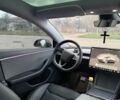 Серый Тесла Модель 3, объемом двигателя 0 л и пробегом 10 тыс. км за 24500 $, фото 3 на Automoto.ua