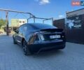 Серый Тесла Модель 3, объемом двигателя 0 л и пробегом 57 тыс. км за 29900 $, фото 2 на Automoto.ua