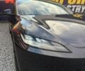 Серый Тесла Модель 3, объемом двигателя 0 л и пробегом 65 тыс. км за 28700 $, фото 10 на Automoto.ua