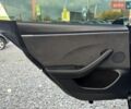 Серый Тесла Модель 3, объемом двигателя 0 л и пробегом 65 тыс. км за 28700 $, фото 18 на Automoto.ua