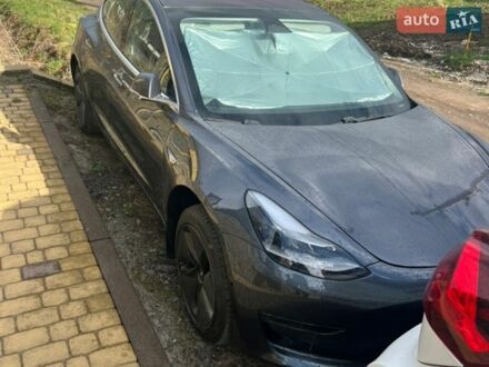 Серый Тесла Модель 3, объемом двигателя 0 л и пробегом 42 тыс. км за 16000 $, фото 1 на Automoto.ua