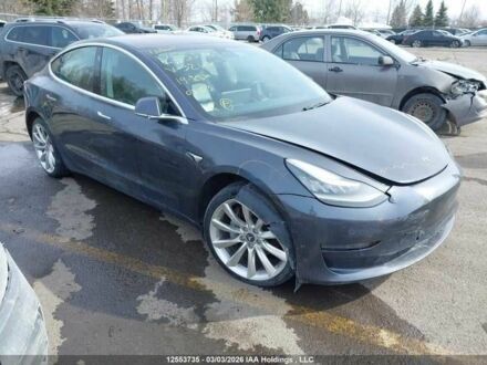 Серый Тесла Модель 3, объемом двигателя 0 л и пробегом 129 тыс. км за 9500 $, фото 1 на Automoto.ua