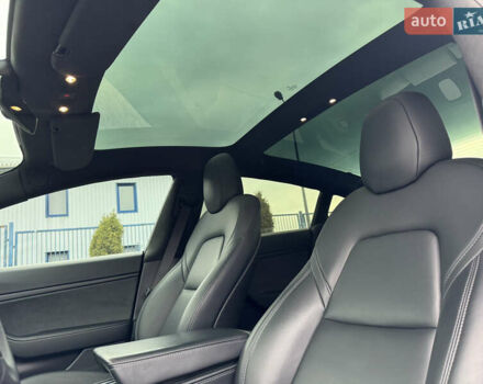 Синий Тесла Модель 3, объемом двигателя 0 л и пробегом 64 тыс. км за 19900 $, фото 16 на Automoto.ua