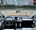 Синий Тесла Модель 3, объемом двигателя 0 л и пробегом 98 тыс. км за 19777 $, фото 25 на Automoto.ua