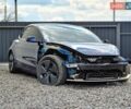 Синий Тесла Модель 3, объемом двигателя 0 л и пробегом 128 тыс. км за 11900 $, фото 1 на Automoto.ua