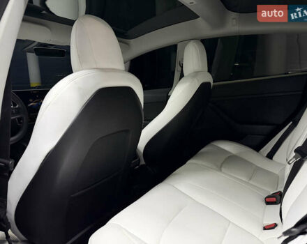 Синий Тесла Модель 3, объемом двигателя 0 л и пробегом 59 тыс. км за 20900 $, фото 21 на Automoto.ua