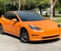 Помаранчевий Тесла Модель 3, об'ємом двигуна 0 л та пробігом 16 тис. км за 11300 $, фото 1 на Automoto.ua