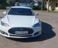 Білий Тесла Модель С, об'ємом двигуна 0 л та пробігом 150 тис. км за 12700 $, фото 1 на Automoto.ua