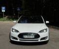 Белый Тесла Модель С, объемом двигателя 0 л и пробегом 153 тыс. км за 15000 $, фото 1 на Automoto.ua