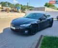 Черный Тесла Модель С, объемом двигателя 0 л и пробегом 222 тыс. км за 12000 $, фото 1 на Automoto.ua