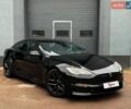 Чорний Тесла Модель С, об'ємом двигуна 0 л та пробігом 54 тис. км за 44999 $, фото 1 на Automoto.ua