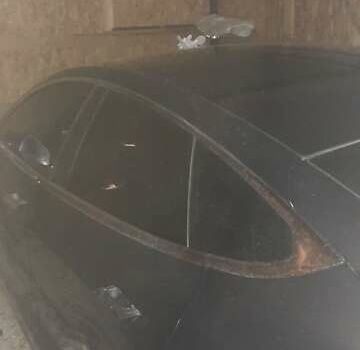 Черный Тесла Модель С, объемом двигателя 0 л и пробегом 123 тыс. км за 11221 $, фото 1 на Automoto.ua