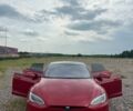 Красный Тесла Модель С, объемом двигателя 0 л и пробегом 153 тыс. км за 16515 $, фото 1 на Automoto.ua