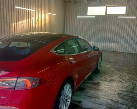 Красный Тесла Модель С, объемом двигателя 0 л и пробегом 87 тыс. км за 11000 $, фото 1 на Automoto.ua