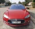Красный Тесла Модель С, объемом двигателя 0 л и пробегом 150 тыс. км за 16650 $, фото 1 на Automoto.ua