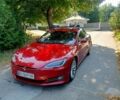 Красный Тесла Модель С, объемом двигателя 0 л и пробегом 140 тыс. км за 18000 $, фото 1 на Automoto.ua
