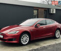 Красный Тесла Модель С, объемом двигателя 0 л и пробегом 127 тыс. км за 14700 $, фото 1 на Automoto.ua