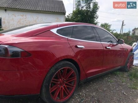 Красный Тесла Модель С, объемом двигателя 0 л и пробегом 180 тыс. км за 8000 $, фото 1 на Automoto.ua