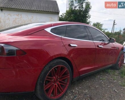Красный Тесла Модель С, объемом двигателя 0 л и пробегом 180 тыс. км за 8000 $, фото 1 на Automoto.ua