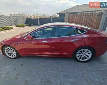 Красный Тесла Модель С, объемом двигателя 0 л и пробегом 167 тыс. км за 15500 $, фото 1 на Automoto.ua