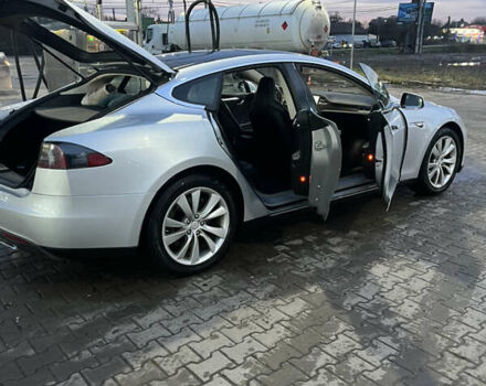 Серый Тесла Модель С, объемом двигателя 0 л и пробегом 298 тыс. км за 15100 $, фото 2 на Automoto.ua