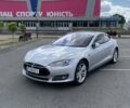 Серый Тесла Модель С, объемом двигателя 0 л и пробегом 133 тыс. км за 18000 $, фото 1 на Automoto.ua