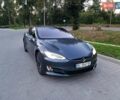 Серый Тесла Модель С, объемом двигателя 0 л и пробегом 140 тыс. км за 26300 $, фото 1 на Automoto.ua