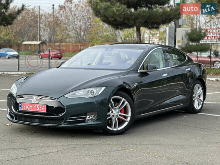 Зеленый Тесла Модель С, объемом двигателя 0 л и пробегом 165 тыс. км за 15300 $, фото 1 на Automoto.ua