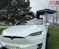 Белый Тесла Модель Х, объемом двигателя 0 л и пробегом 133 тыс. км за 27999 $, фото 1 на Automoto.ua