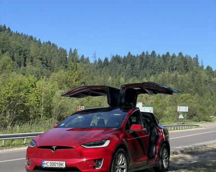 Красный Тесла Модель Х, объемом двигателя 0 л и пробегом 99 тыс. км за 39500 $, фото 75 на Automoto.ua