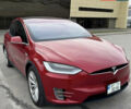 Красный Тесла Модель Х, объемом двигателя 0 л и пробегом 106 тыс. км за 23000 $, фото 1 на Automoto.ua