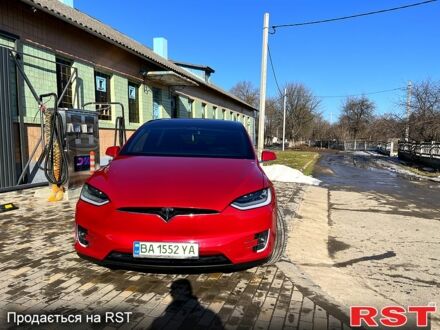 Красный Тесла Модель Х, объемом двигателя 0.53 л и пробегом 99 тыс. км за 27500 $, фото 1 на Automoto.ua
