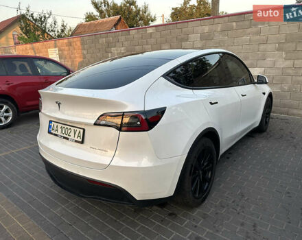 Білий Тесла Model Y, об'ємом двигуна 0 л та пробігом 63 тис. км за 34999 $, фото 8 на Automoto.ua