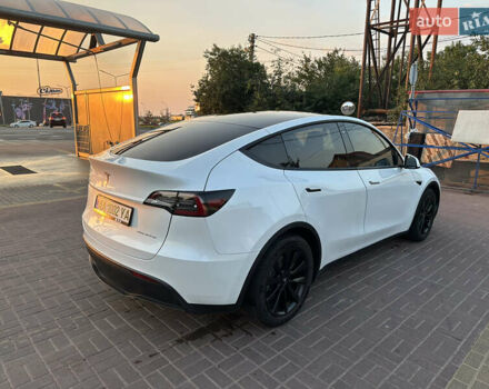 Білий Тесла Model Y, об'ємом двигуна 0 л та пробігом 63 тис. км за 34999 $, фото 6 на Automoto.ua