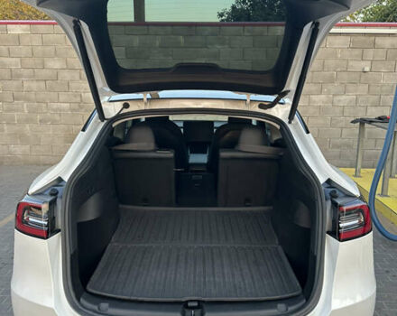 Білий Тесла Model Y, об'ємом двигуна 0 л та пробігом 63 тис. км за 34999 $, фото 3 на Automoto.ua