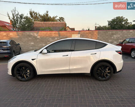 Білий Тесла Model Y, об'ємом двигуна 0 л та пробігом 63 тис. км за 34999 $, фото 2 на Automoto.ua