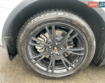 Білий Тесла Model Y, об'ємом двигуна 0 л та пробігом 70 тис. км за 24500 $, фото 32 на Automoto.ua