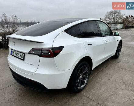 Белый Тесла Model Y, объемом двигателя 0 л и пробегом 77 тыс. км за 25000 $, фото 38 на Automoto.ua