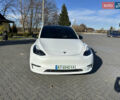 Белый Тесла Model Y, объемом двигателя 0 л и пробегом 85 тыс. км за 22900 $, фото 1 на Automoto.ua