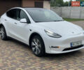 Білий Тесла Model Y, об'ємом двигуна 0 л та пробігом 61 тис. км за 20300 $, фото 1 на Automoto.ua