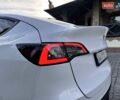 Білий Тесла Model Y, об'ємом двигуна 0 л та пробігом 100 тис. км за 20999 $, фото 25 на Automoto.ua