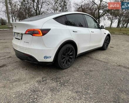 Білий Тесла Model Y, об'ємом двигуна 0 л та пробігом 127 тис. км за 22999 $, фото 4 на Automoto.ua